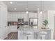 Well-equipped kitchen with granite counters, stainless appliances, and convenient breakfast bar at 17825 Gallup St, Broomfield, CO 80023