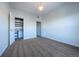 Spacious bedroom with carpet flooring and ample closet space at 9335 Amison Cir # 201, Parker, CO 80134