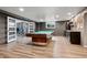 This basement has a pool table and gym that is perfect for entertaining guests at 5145 S Logan Dr, Littleton, CO 80121