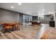 This basement has a pool table and sitting area that is perfect for entertaining guests at 5145 S Logan Dr, Littleton, CO 80121