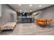 This basement has a full seating area perfect for entertaining guests at 5145 S Logan Dr, Littleton, CO 80121