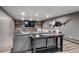 This basement has a full seating area and fireplace perfect for entertaining guests at 5145 S Logan Dr, Littleton, CO 80121