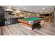 This basement has a pool table and bar for endless entertainment at 5145 S Logan Dr, Littleton, CO 80121