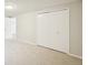 Spacious bedroom featuring a closet and a door at 574 El Paso Rd, Palmer Lake, CO 80133