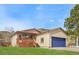 Charming single Gathering house with a deck and an attached garage; beautiful lawn in front at 574 El Paso Rd, Palmer Lake, CO 80133