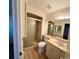 Nicely updated bathroom featuring a walk-in shower and stylish vanity at 769 S Youngfield Ct, Lakewood, CO 80228