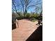 Outdoor wooden deck, perfect for relaxation and outdoor seating with mature trees at 1390 S Ammons St, Lakewood, CO 80232