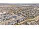 A beautiful aerial view showcasing a neighborhood with diverse architectural styles and well-maintained green spaces at 4644 S Kipling Cir, Littleton, CO 80123