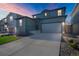 Charming two-story home featuring a two-car garage and a well-maintained front yard at 4644 S Kipling Cir, Littleton, CO 80123