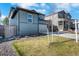 Well-maintained home with a manicured lawn and tasteful landscaping at 4644 S Kipling Cir, Littleton, CO 80123