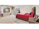 Bright main bedroom suite with a large window and ample closet space at 4644 S Kipling Cir, Littleton, CO 80123