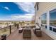 Outdoor deck area with patio furniture and stunning views of the surrounding landscape at 7360 Almandine Ct, Castle Rock, CO 80108