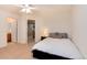 Bedroom with a ceiling fan and access to the upper floor at 7360 Almandine Ct, Castle Rock, CO 80108