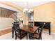 Formal dining room with a classic table set and elegant lighting at 7360 Almandine Ct, Castle Rock, CO 80108