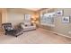 Comfortable living room featuring neutral paint and plush seating at 7360 Almandine Ct, Castle Rock, CO 80108