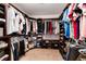 Large walk-in closet with custom shelving and plenty of space for clothes, shoes, and accessories at 7360 Almandine Ct, Castle Rock, CO 80108