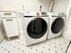 Convenient laundry area with front loading Samsung washer and dryer at 1640 Pontiac St, Denver, CO 80220