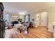 Spacious living room with hardwood floors, fireplace, and stylish decor at 1640 Pontiac St, Denver, CO 80220