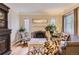 Comfortable living room with hardwood floors, fireplace and plenty of natural light at 1640 Pontiac St, Denver, CO 80220