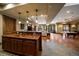 Basement with stylish bar, granite countertops, and an open floor plan with a pool table at 214 Equinox Dr, Castle Rock, CO 80108