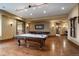 Spacious basement includes pool table and games area at 214 Equinox Dr, Castle Rock, CO 80108