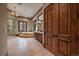 Stunning primary bathroom features a standalone tub, glass shower, and exquisite chandelier lighting at 214 Equinox Dr, Castle Rock, CO 80108