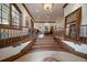 Elegant foyer with grand staircase, hardwood floors, and stunning architectural details at 214 Equinox Dr, Castle Rock, CO 80108