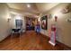 Unique game room with a pinball machine, vintage candy dispenser, and movie memorabilia at 214 Equinox Dr, Castle Rock, CO 80108