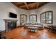 Cozy living room with fireplace, comfortable seating, and ample natural light at 214 Equinox Dr, Castle Rock, CO 80108