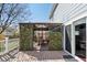 Spacious wooden back deck with an enclosed dining area at 13818 Krameria St, Thornton, CO 80602