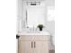 Beautifully designed bathroom featuring a modern vanity and stylish fixtures at 2090 Eliot St, Denver, CO 80211
