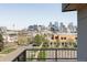 Enjoy breathtaking city views from the balcony of this home at 2090 Eliot St, Denver, CO 80211