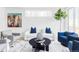 Stylishly furnished living room offers a comfortable and inviting atmosphere at 2090 Eliot St, Denver, CO 80211