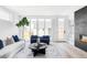 Beautifully decorated living room with a fireplace, stylish seating, and modern accents at 2090 Eliot St, Denver, CO 80211