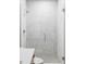 Modern bathroom features a sleek glass-enclosed shower with stylish tile at 2090 Eliot St, Denver, CO 80211