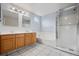 Bathroom boasts double sinks, soaking tub, and shower at 11480 Moline St, Commerce City, CO 80640