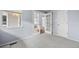 Cozy carpeted bedroom with french doors and neutral-colored walls at 11480 Moline St, Commerce City, CO 80640