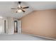 Primary bedroom with vaulted ceiling and ceiling fan at 11480 Moline St, Commerce City, CO 80640