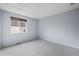Bright bedroom with neutral walls and carpet flooring at 11480 Moline St, Commerce City, CO 80640