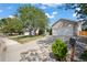 House exterior with a two-car garage and a manicured lawn at 11480 Moline St, Commerce City, CO 80640