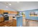 Kitchen with stainless steel appliances and light wood cabinets at 11480 Moline St, Commerce City, CO 80640