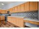 Modern kitchen with ample counter space and wood cabinets at 11480 Moline St, Commerce City, CO 80640
