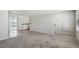 Versatile bonus room featuring neutral paint, hardwood-style floors, and a wet bar, perfect for entertaining guests at 19802 E 54Th Ave, Denver, CO 80249