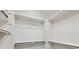 Walk-in closet with metal rods and shelves for organization at 19802 E 54Th Ave, Denver, CO 80249