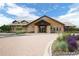 Beautiful clubhouse exterior with stone accents, landscaping, and inviting entrance perfect for gatherings at 19802 E 54Th Ave, Denver, CO 80249