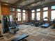 Well-equipped fitness center with treadmills, ellipticals, and weight machines for a complete workout at 19802 E 54Th Ave, Denver, CO 80249
