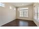 Office features hardwood floors, a large window, and neutral paint at 19802 E 54Th Ave, Denver, CO 80249