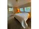 Bedroom with a queen bed, window seat, and ample closet space at 4375 Tongue Rd, Indian Hills, CO 80454