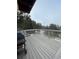 Spacious deck with mountain views and a built-in grill at 4375 Tongue Rd, Indian Hills, CO 80454