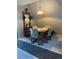 Small dining area with a table and chairs, and a patterned rug at 4375 Tongue Rd, Indian Hills, CO 80454